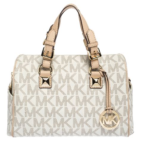 michael kors barrel canvas purse beige|Michael Kors bags and prices.